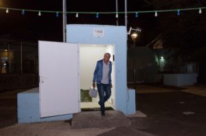 Photo: A man seen at the entrance to a bomb shelter that was open in the Golan Heights, in northern Israel, May 8, 2018. (Basel Awidat/Flash90)