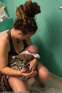 Photo: The midwife arrived 18 minutes after Brittany has given birth and immediately checked Nash's heartbeat and made sure she was OK. Pictured, holding newborn baby Nash, with husband Zane, 31