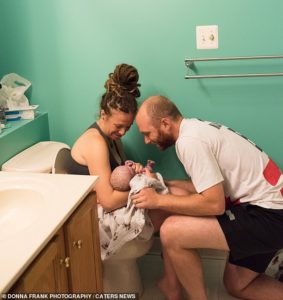 Mother shares raw photographs taken after she gave birth to her son in just 20 minutes while sitting on the toilet at home - and says she feels 'empowered' by the images