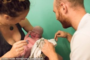 Mother shares raw photographs taken after she gave birth to her son in just 20 minutes while sitting on the toilet at home - and says she feels 'empowered' by the images